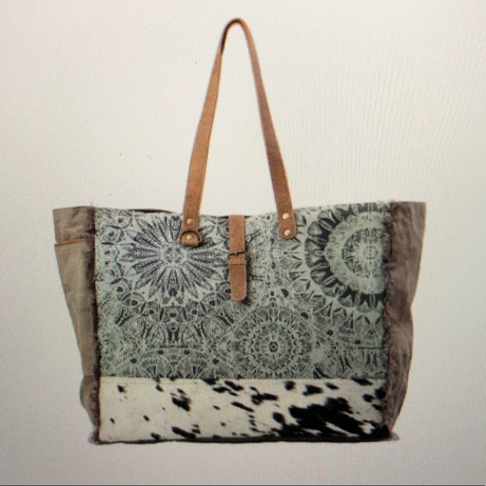 myra duffle bag; cowhide
